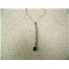 Image 1 : Emerald (approx. 0.60 carats) and Diamond (approx. 0.13 carats) Pendant and Chain 14 K yellow gold, 