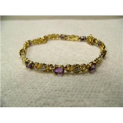 Amethyst (approx. 4.00 carats) and Diamond (approx. 0.06 carats) Bracelet 10 K yellow gold, replacem