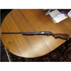 20-gauge pump action sot gun by Ithaca model #37 with engraved hunting dog scene on trigger housing 