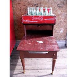 1 End table; 20 6-1/2 oz. glass Coca-Cola bottles in wooden Coca-Cola carry box (32)