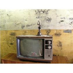 1 GE television model #19PF67O4; 1 top of desk cabinet (32)