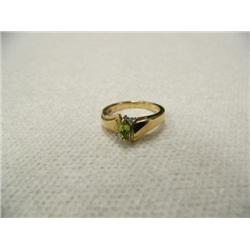 Peridot (approx. 0.25 carats) and Diamond (approx. 0.03 carats) Lady's Ring 10 K yellow gold, replac