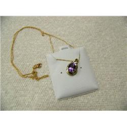 Amethyst (approx. 1.00 carats) and Diamond (approx. 0.50 carats) Pendant and Chain 10 K yellow gold,
