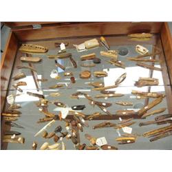 Outstanding collection of 100+ old Eskimo ivory artifacts: consisting of seal harpoons, net weights,