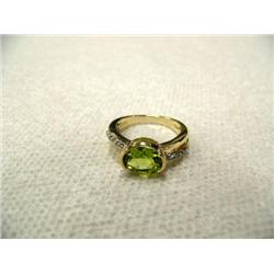 Peridot (approx. 2.00 carats) and Diamond (approx. 0.13 carats) Lady's Ring 14 K yellow gold, replac