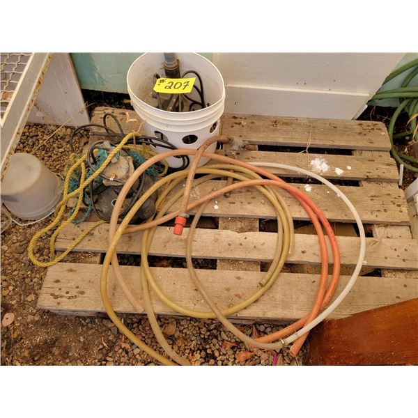 2- Sump pumps, 1- working & 1- for parts