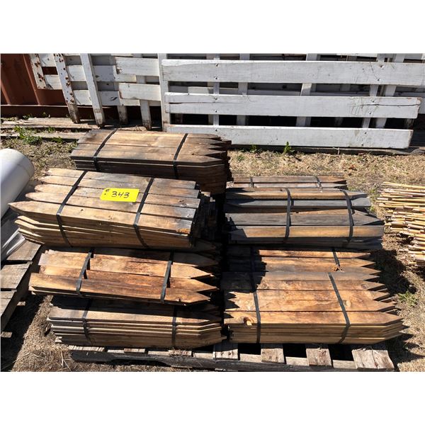 14 bundles  of new wood stakes