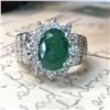 Image 5 : Oval-Cut Emerald and Stately Diamond Halo Ring