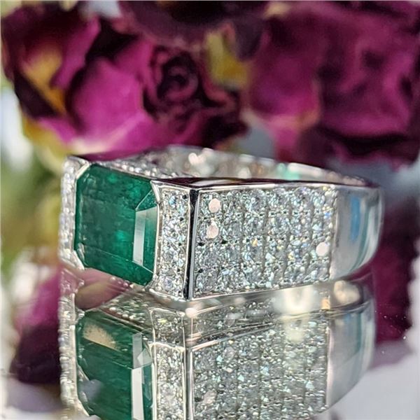 Prestigious East-West Emerald and Diamond Ring