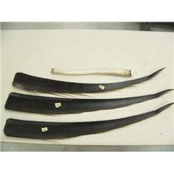 15" oosik with baleen and ivory with gold nugget on the end by Paul Tiulana; 3 32" long pieces of ba