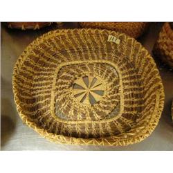 Native basket made with pine needles probably from Oregon square about 11" with star design in inter