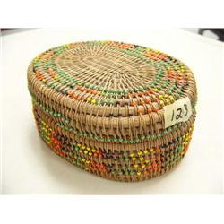 6" oval basket with old trade beads made by Ute Indians from Colorado made with rice grass and ratta
