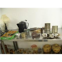 Large lot of kitchen collectibles:  assorted kitchen utensils; flat irons; cookie cutters; flour sif