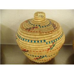 11" grass basket from Bethel area with red, blue, purple designs in excellent condition (39)
