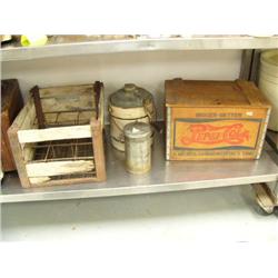 Old wood metal crate; old ice cream maker; wood Pepsi-Cola crate that says "Nickel Drink Worth a Dim