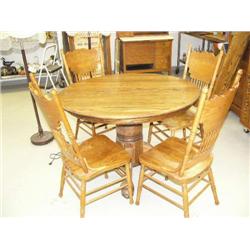 Round oak table with 4 pressed back chairs (39)