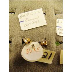 Pair of diamond earrings about 20 point and small 10 point diamond (27)