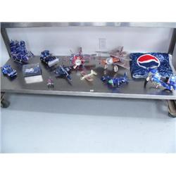 9 assorted vehicles made from Pepsi cans: 4 airplanes; 1 free-masted sailing vessel; 1 motorcycle; 1