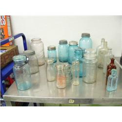 Collection of assorted fruit jars including very rare green 1-qt lightning fruit jar Putman 862, gla