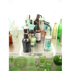 Rare collection of Alaska bottles and cans: 1-qt Seward milk bottle; Fairbanks logger; Silver Gulch 