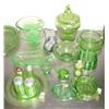Image 2 : 18 pieces of green depression glass: covered candy dish; salt and pepper shakers; salt dips; toothpi