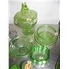 Image 5 : 18 pieces of green depression glass: covered candy dish; salt and pepper shakers; salt dips; toothpi