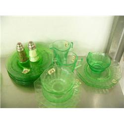 19 pieces of optic green depression glass: plates, cups, saucers, salt and pepper shakers (39)