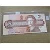 Image 2 : 1986 POKER HAND SERIAL NUMBER CANADA $2 BILL