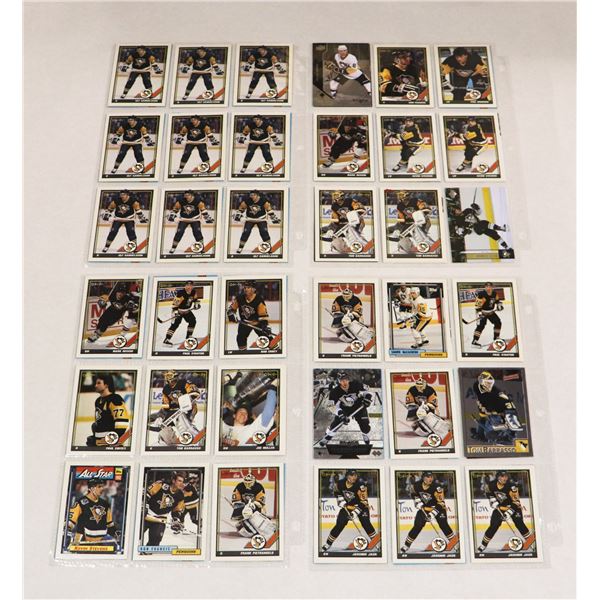 BUNDLE OF HOCKEY CARDS IN PROTECTIVE SLEEVES