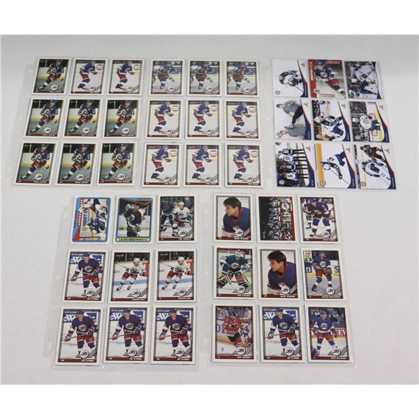 BUNDLE OF HOCKEY CARDS IN PROTECTIVE SLEEVES