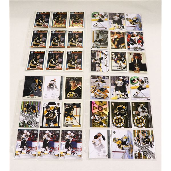 BUNDLE OF HOCKEY CARDS IN PROTECTIVE SLEEVES