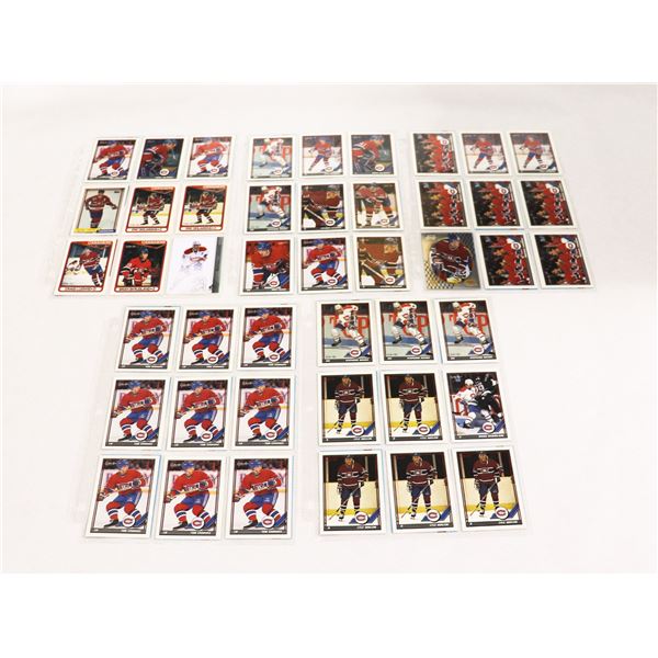 BUNDLE OF HOCKEY CARDS IN PROTECTIVE SLEEVES