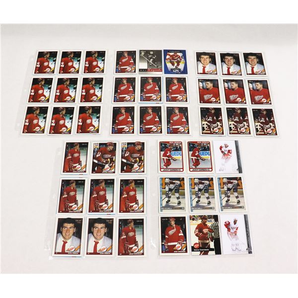 BUNDLE OF HOCKEY CARDS IN PROTECTIVE SLEEVES