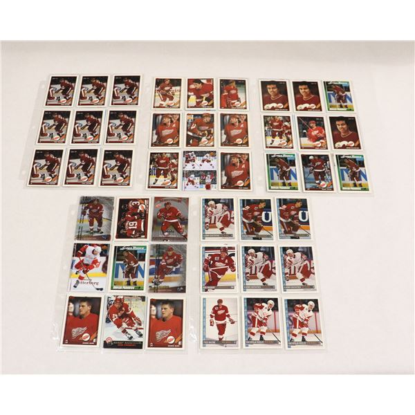 BUNDLE OF HOCKEY CARDS IN PROTECTIVE SLEEVES