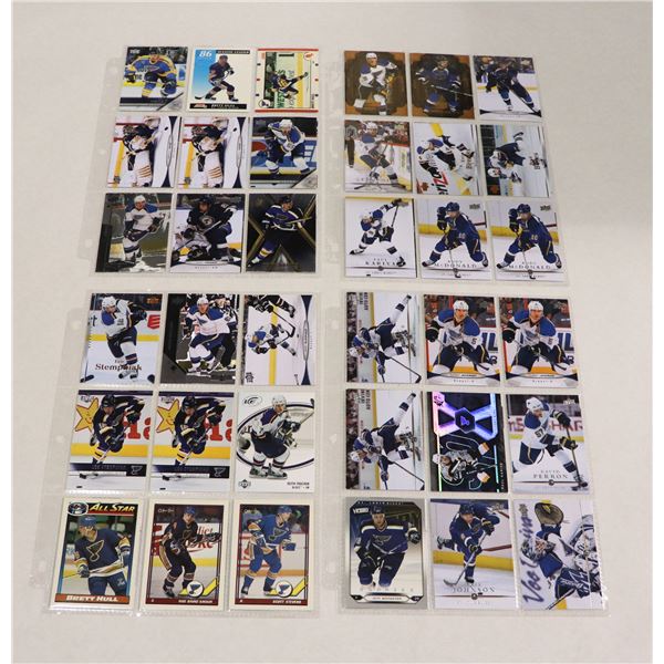 BUNDLE OF HOCKEY CARDS IN PROTECTIVE SLEEVES