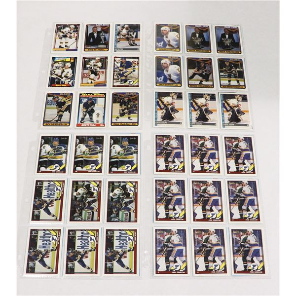 BUNDLE OF HOCKEY CARDS IN PROTECTIVE SLEEVES