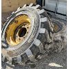 LOT OF 2 - SKID STEER TIRES ON RIMS - 305 / 70-16.5