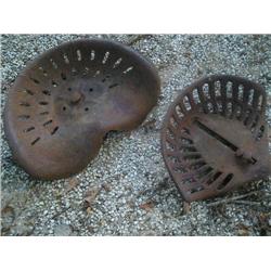 Two old tractor seats