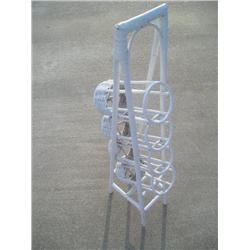 White wicker wine rack