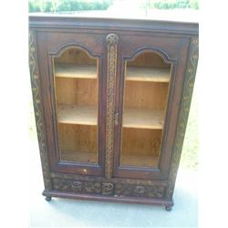 Wood carved curio cabinet