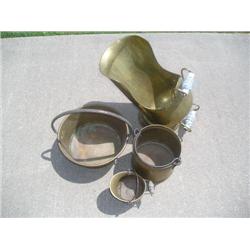 Four brass pots