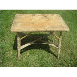 Natural wicker, wood top porch table.