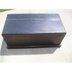 Black chest w/brass handles