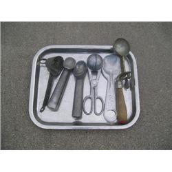 Old ice cream scoops on tray
