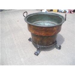 Copper pot on heavey iron base