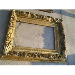 Heavy gold ornate frame
