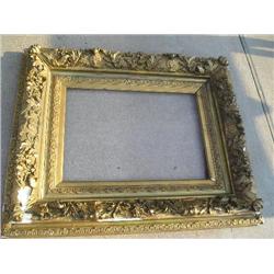 Heavy gold ornate frame