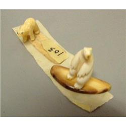 Pair of ivory bears on ivory base (2)