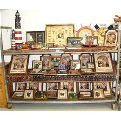 Whole cart- 3 shelves- of nautical items, framed sea shells, butterflies in framed, framed daggers, 