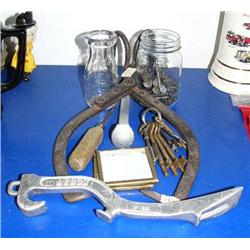 Pair of ice tongs, fireman's tool, lot of brass ship's keys, 2 Bell Telephone system mirrors, lot of